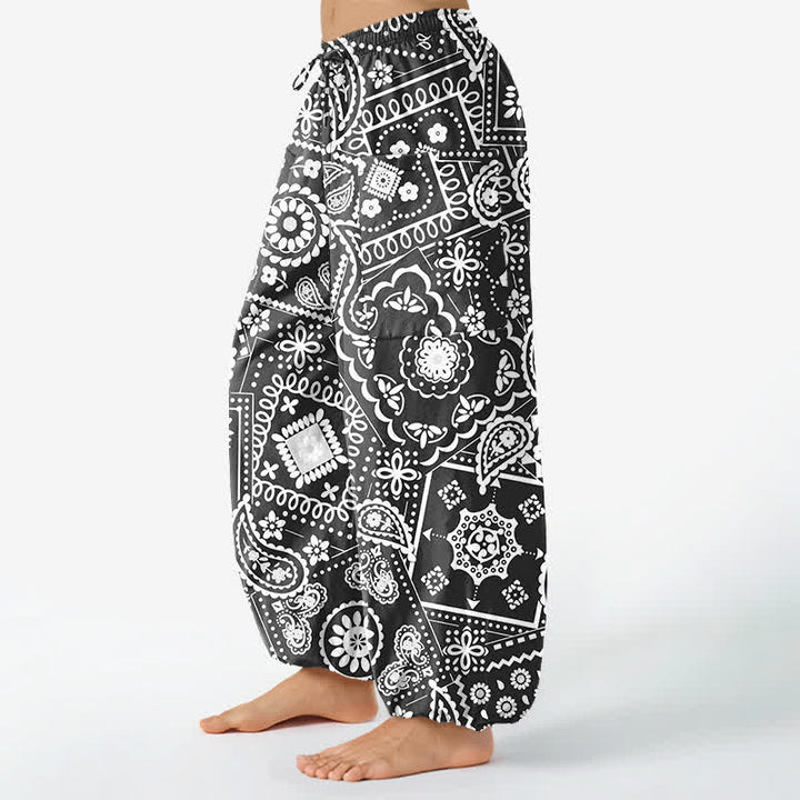 Buddha Stones Pantaloni harem da donna in cotone stile bohémien con fantasia paisley e bandana, vita elasticizzata e tasche laterali. - image 1