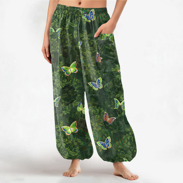Buddha Stones Pantaloni harem da donna in cotone con elastico in vita e tasche laterali, ispirati alla natura, con motivo a farfalle e foglie. - Verde studentesco - US16, UK/AU20, EU48 (3XL) - image 0