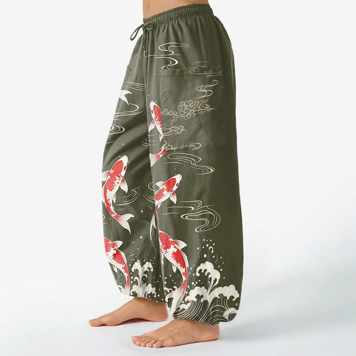 Buddha Stones Pantaloni harem da donna in cotone con elastico in vita e motivo onde marine e carpe koi, con tasche laterali. - image 11