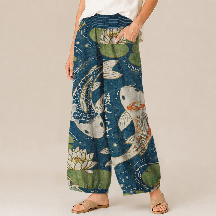 Buddha Stones Pantaloni harem da donna in cotone con motivo a pieghe e vita elasticizzata, con tasche, stampa di carpe koi orientali e loto. - image 1
