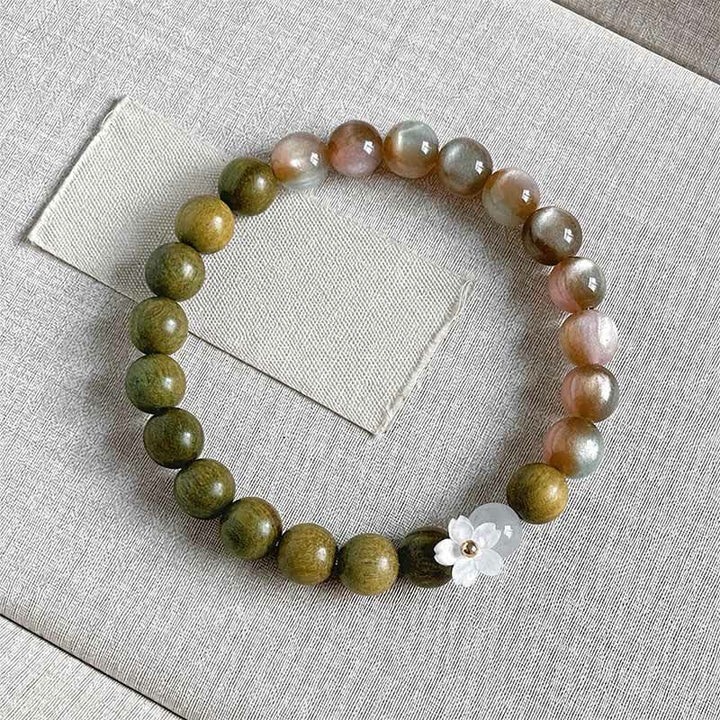 Buddha Stones Bracciale Serenity con ciondolo a forma di fiore occhio di gatto in legno di sandalo verde. - Perline rosa da 8 mm - image 0