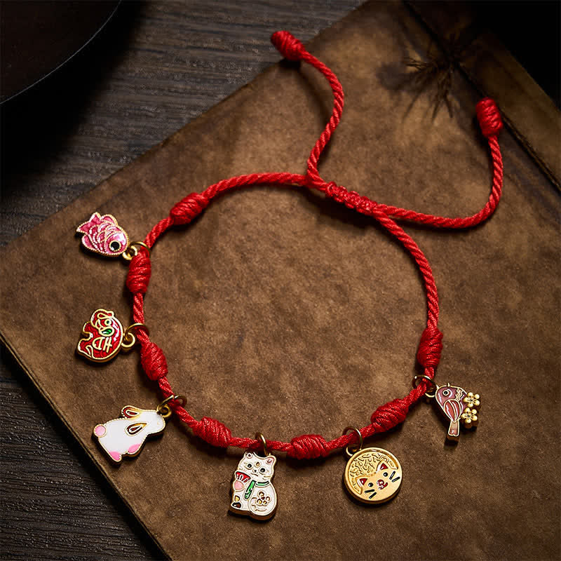 Buddha Stones Braccialetto portafortuna fatto a mano con sette nodi, filo rosso, carpe koi, elefanti, conigli, gatti e gazze viola. - image 1