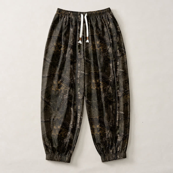 Buddha Stones Pantaloni harem da uomo in puro cotone con coulisse e tasche, fantasia mimetica effetto marmo. - image 1