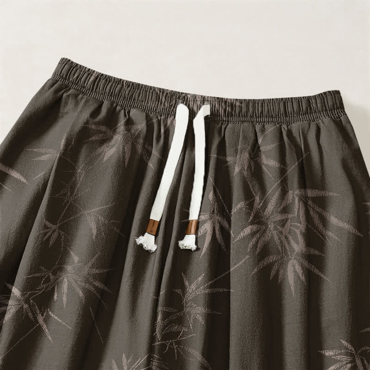Buddha Stones Pantaloni harem da uomo in puro cotone con coulisse e tasche, fantasia a foglie di bambù. - image 3