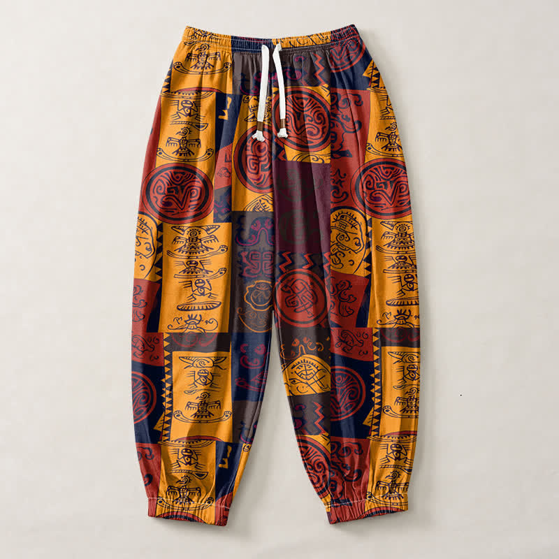 Buddha Stones Pantaloni harem da uomo in puro cotone con coulisse e tasche, decorati con motivo patchwork a medaglioni tribali. - image 1