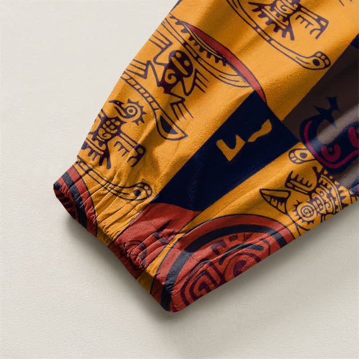 Buddha Stones Pantaloni harem da uomo in puro cotone con coulisse e tasche, decorati con motivo patchwork a medaglioni tribali. - image 4