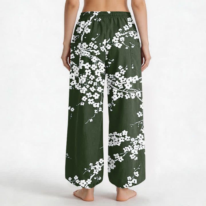 Buddha Stones Pantaloni harem da donna in cotone bianco con motivo a fiori di pruno, vita elasticizzata e tasche laterali. - image 9