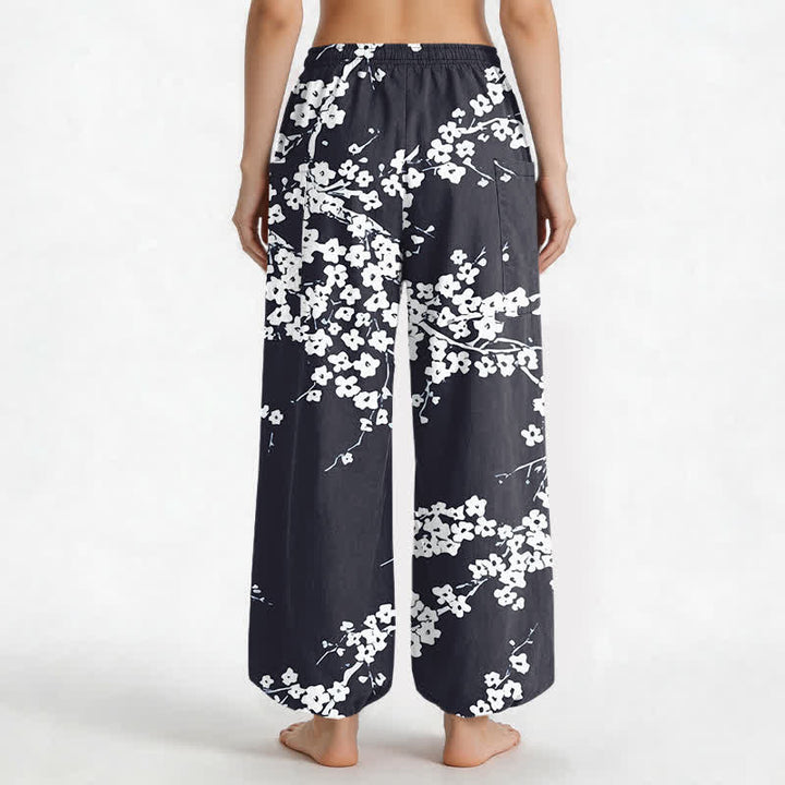 Buddha Stones Pantaloni harem da donna in cotone bianco con motivo a fiori di pruno, vita elasticizzata e tasche laterali. - image 12