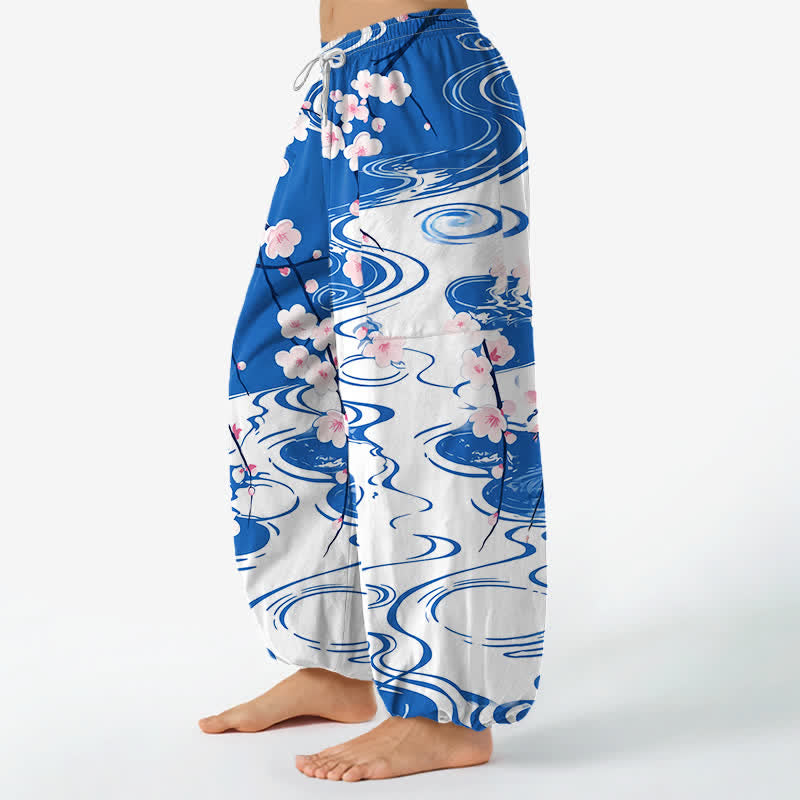 Buddha Stones Pantaloni harem da donna in cotone con motivo a onde di fiori di ciliegio e vita elasticizzata, con tasche laterali. - image 1