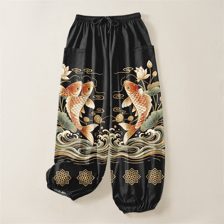 Buddha Stones Pantaloni harem da donna in cotone con elastico in vita e motivo a onde di loto e koi dorati, con tasche laterali. - image 3