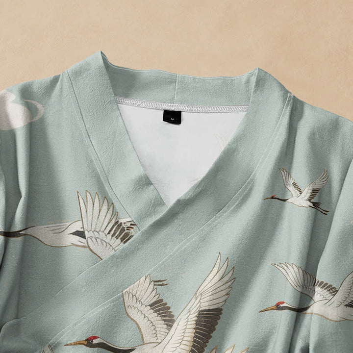 Kimono da donna a maniche lunghe con scollo a V e allacciatura, in cotone con stampa di gru volanti Buddha Stones. - image 2