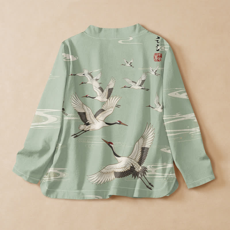 Kimono da donna a maniche lunghe con scollo a V e allacciatura, in cotone con stampa di gru volanti Buddha Stones. - image 6