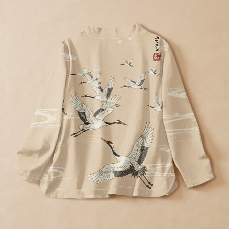 Kimono da donna a maniche lunghe con scollo a V e allacciatura, in cotone con stampa di gru volanti Buddha Stones. - image 8