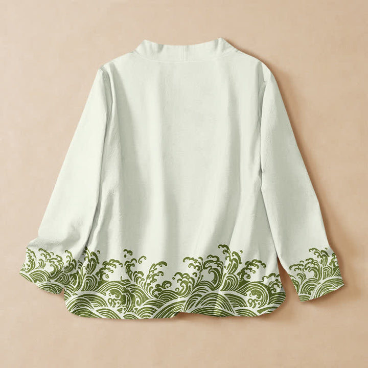 Kimono da donna a maniche lunghe con scollo a V e allacciatura, in cotone con stampa Buddha Stones e onde oceaniche. - image 8