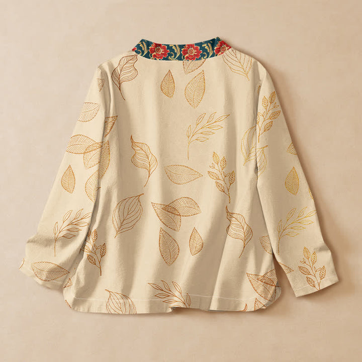 Kimono da donna a maniche lunghe con scollo a V e allacciatura, in cotone con stampa di foglie dorate e fiori rossi e motivo Buddha Stones. - image 1