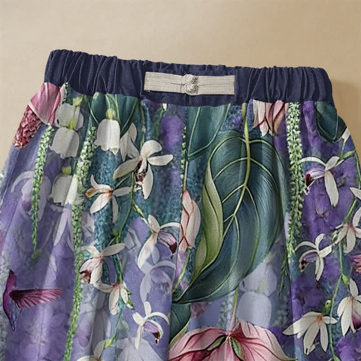 Buddha Stones Pantaloni harem da donna in puro cotone con motivo floreale ad acquerello e colibrì, bottoni a rana e vita elasticizzata con tasche. - image 2