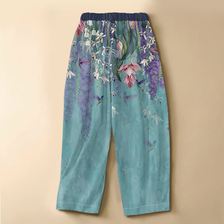 Buddha Stones Pantaloni harem da donna in puro cotone con motivo floreale ad acquerello e colibrì, bottoni a rana e vita elasticizzata con tasche. - image 8
