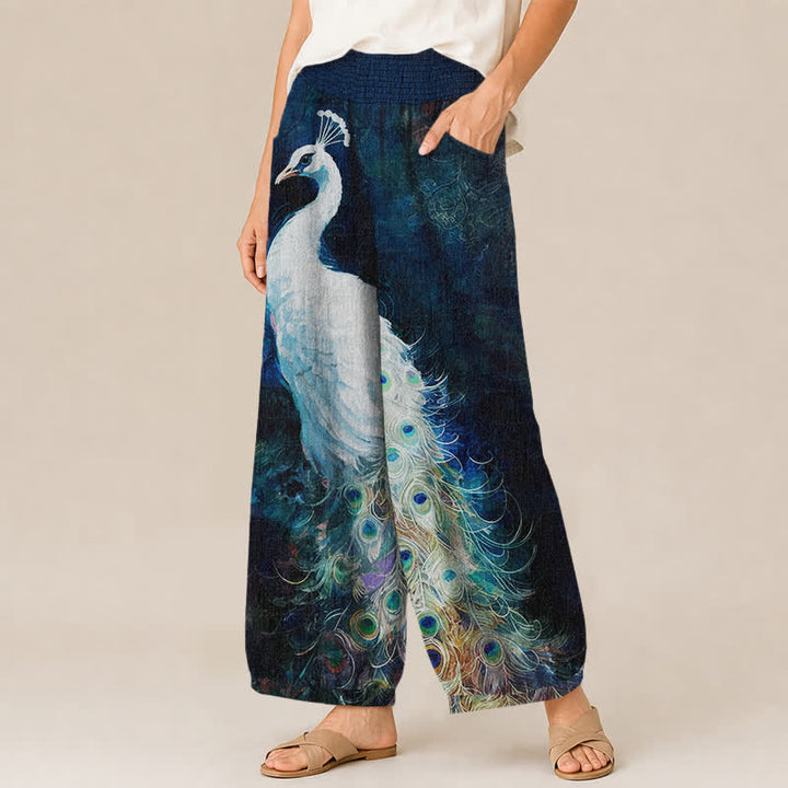 Buddha Stones Pantaloni harem da donna in cotone bianco con motivo a piume di pavone, plissettati e vita elasticizzata, con tasche. - image 1
