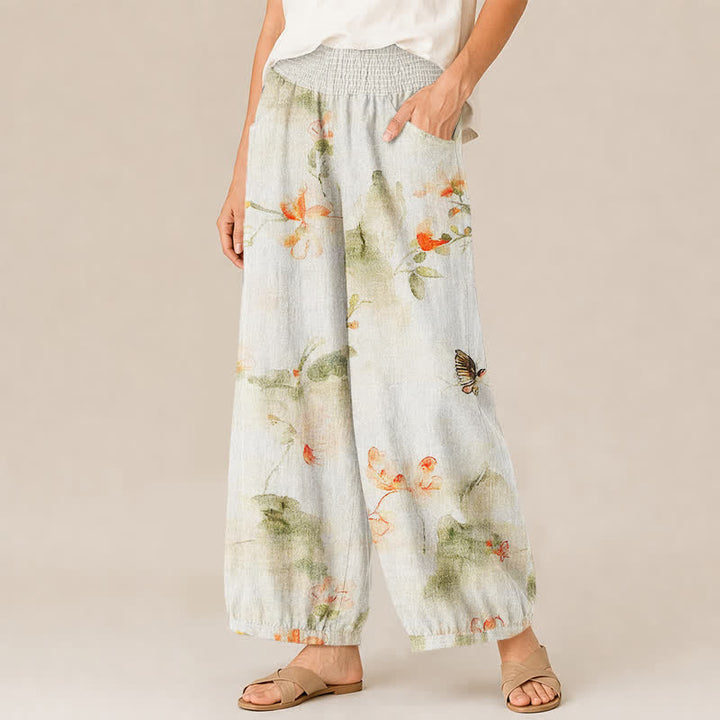 Buddha Stones Pantaloni harem da donna in cotone con stampa floreale ad acquerello e farfalle, plissettati e vita elasticizzata, con tasche. - image 1