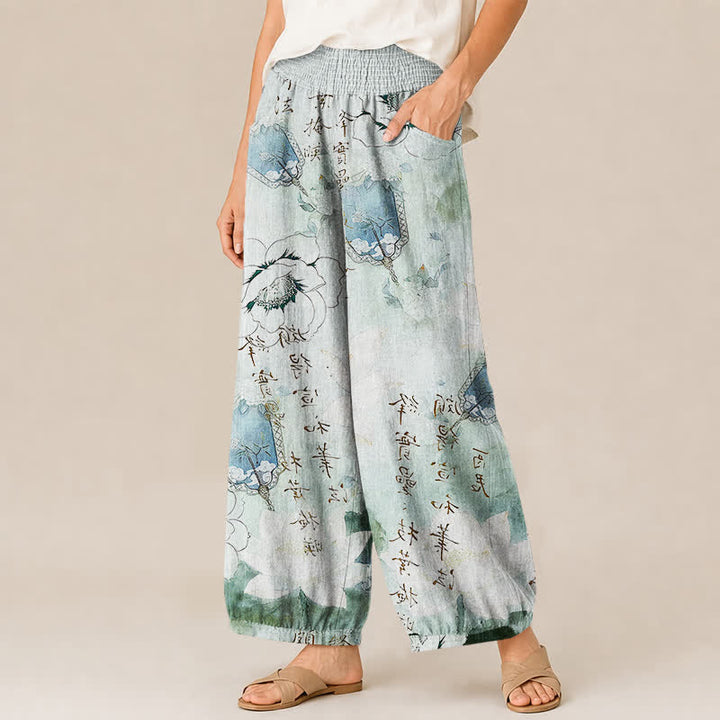 Buddha Stones Pantaloni harem da donna in cotone con motivo floreale acquerellato e calligrafia, vita elasticizzata e pieghe, con tasche. - image 1