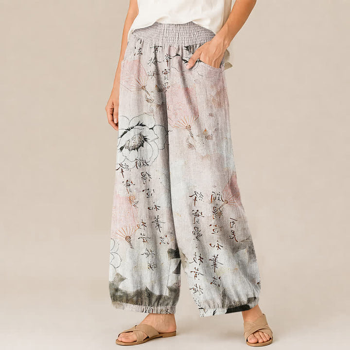 Buddha Stones Pantaloni harem da donna in cotone con motivo floreale acquerellato e calligrafia, vita elasticizzata e pieghe, con tasche. - image 7