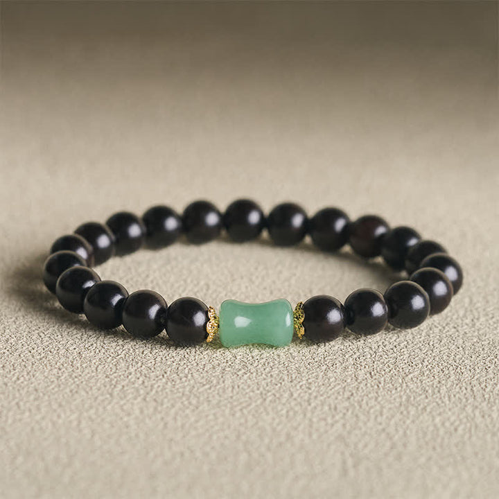 Buddha Stones Bracciale unisex in legno di ebano, sandalo verde con venature naturali. - Legno d'ebano (Equilibrio ♥ Calma) - image 0