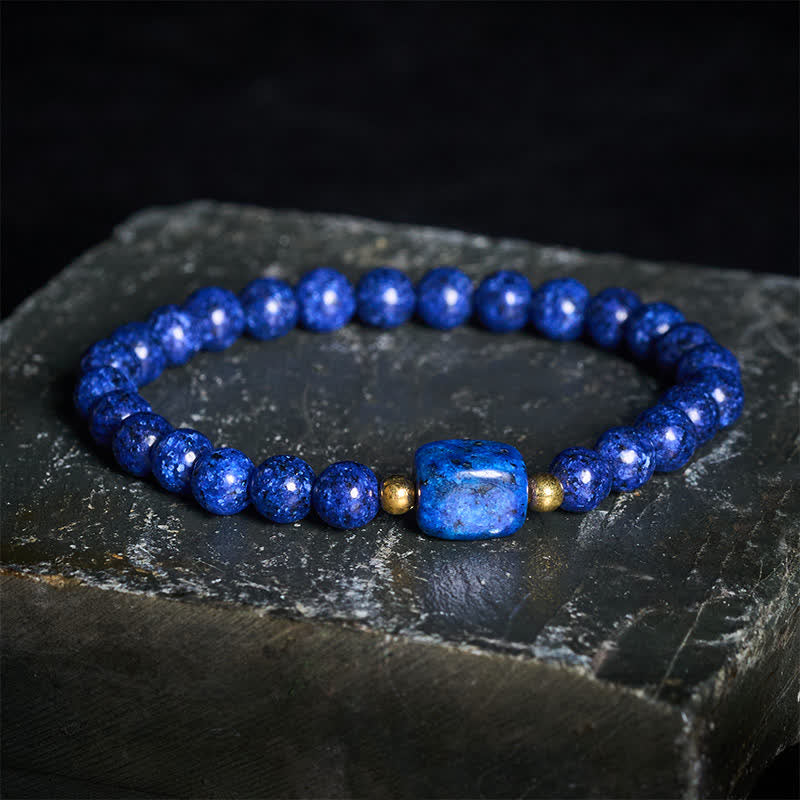 Buddha Stones Bracciale minimalista elastico con perline di lapislazzuli e simbolo di saggezza. - Lapislazzuli (Equilibrio ♥ Serenità) - image 0