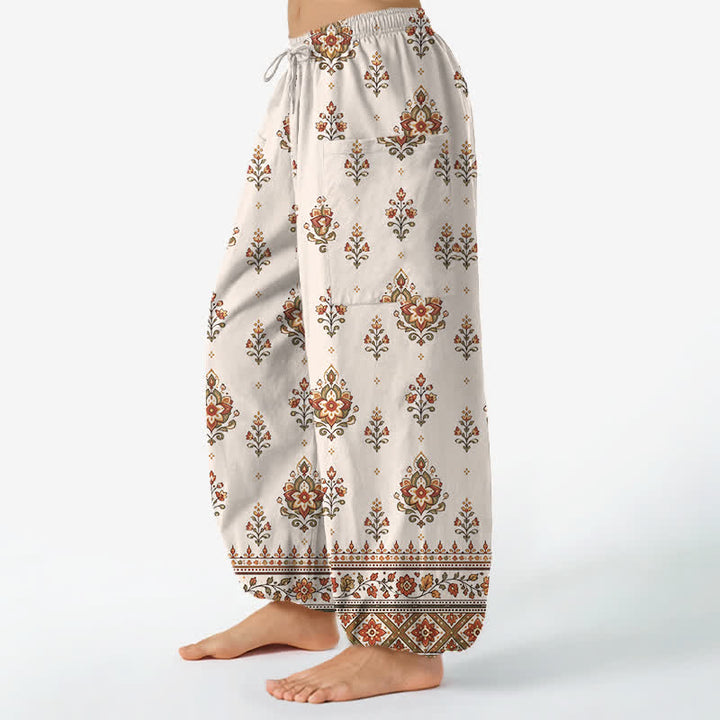 Buddha Stones Pantaloni harem da donna in cotone, stile bohémien, con fantasia floreale etnica e vita elasticizzata, dotati di tasche laterali. - image 1