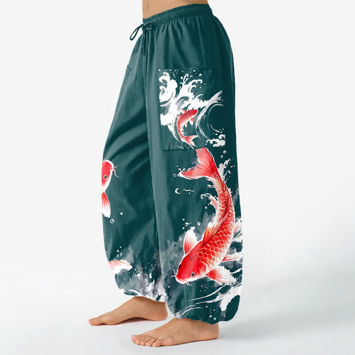 Buddha Stones Pantaloni harem da donna in cotone con elastico in vita e motivo a pesci koi, con tasche laterali. - image 8