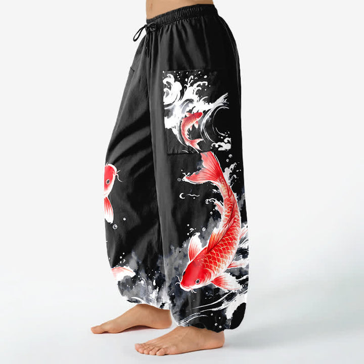 Buddha Stones Pantaloni harem da donna in cotone con elastico in vita e motivo a pesci koi, con tasche laterali. - image 11