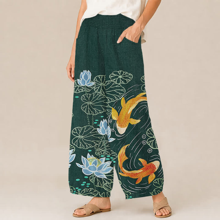 Buddha Stones Pantaloni harem da donna in cotone con stampa acquerello di loto e carpa koi, vita elasticizzata e pieghe, con tasche. - image 1