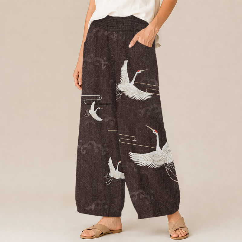 Buddha Stones Pantaloni harem da donna in cotone vintage bianco con motivo a gru, plissettati e vita elasticizzata, con tasche. - image 1