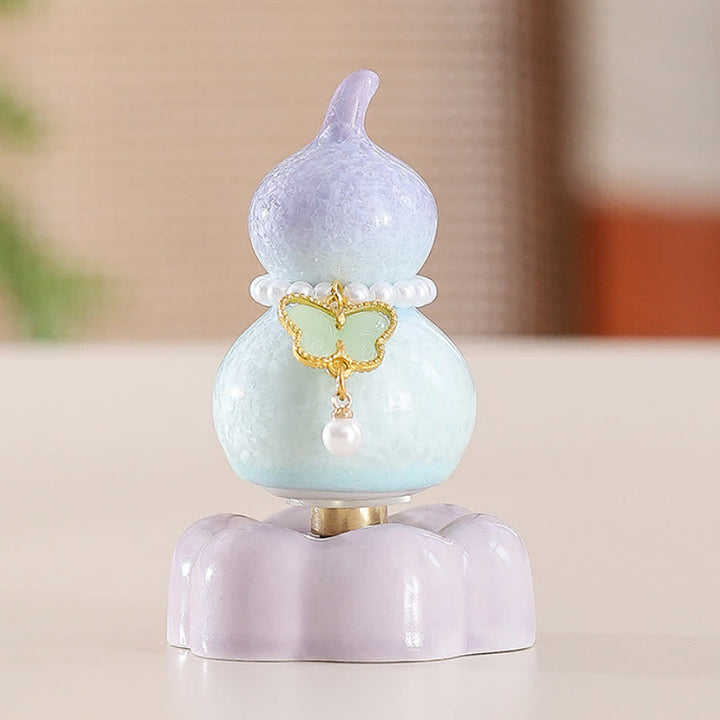 Buddha Stones Zucca a forma di farfalla in ceramica girevole, decorazione per uno stile di vita consapevole. - Zucca viola + Farfalla verde chiaro + Base viola - image 9