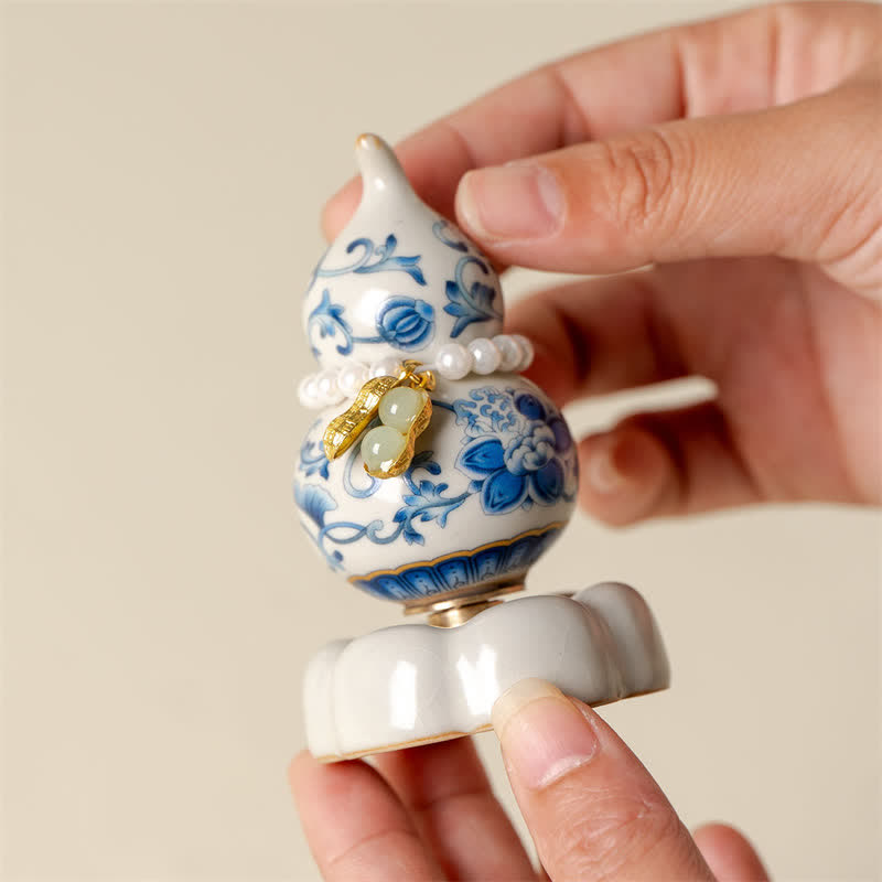 Buddha Stones Zucca girevole in ceramica blu e bianca a forma di loto, decorazione per uno stile di vita consapevole. - image 3