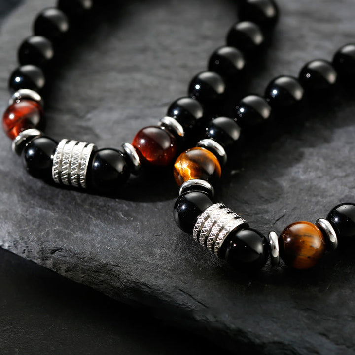Bracciale Buddha Stones in ossidiana nera naturale con occhio di tigre e forza - image 3