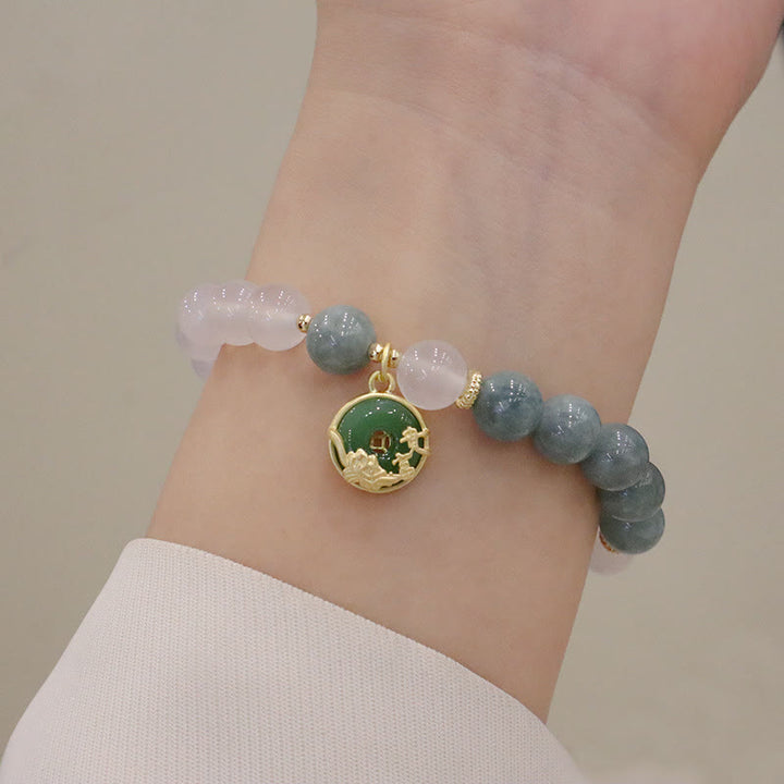 Braccialetto di protezione con fibbia della pace, fiore di loto, agata bianca e giada Buddha Stones