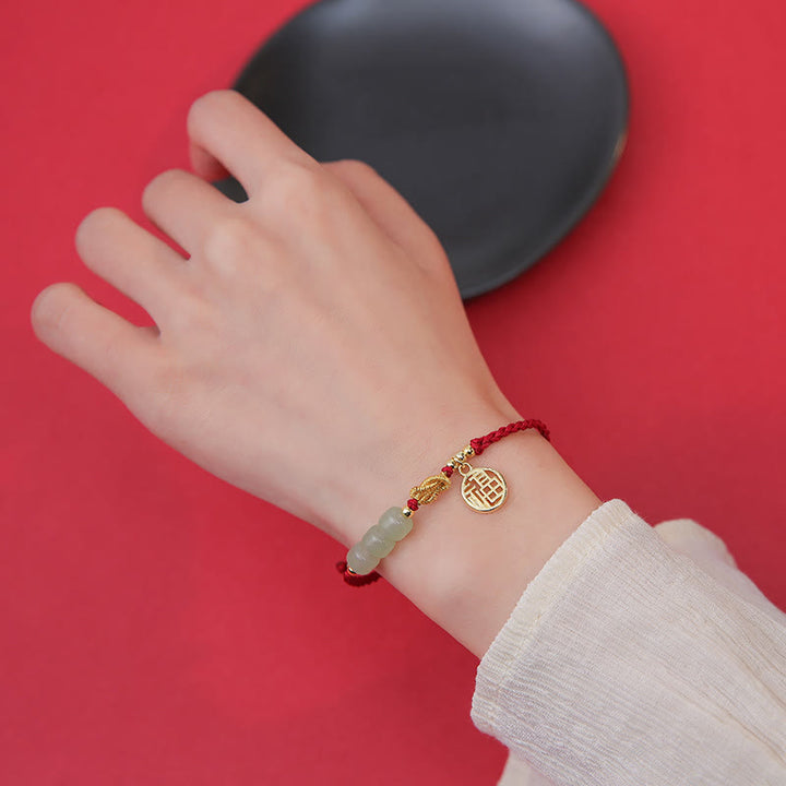 Braccialetto con corda rossa con ciondolo a forma di carattere Fu, con perline di giada lavorate a mano Buddha Stones