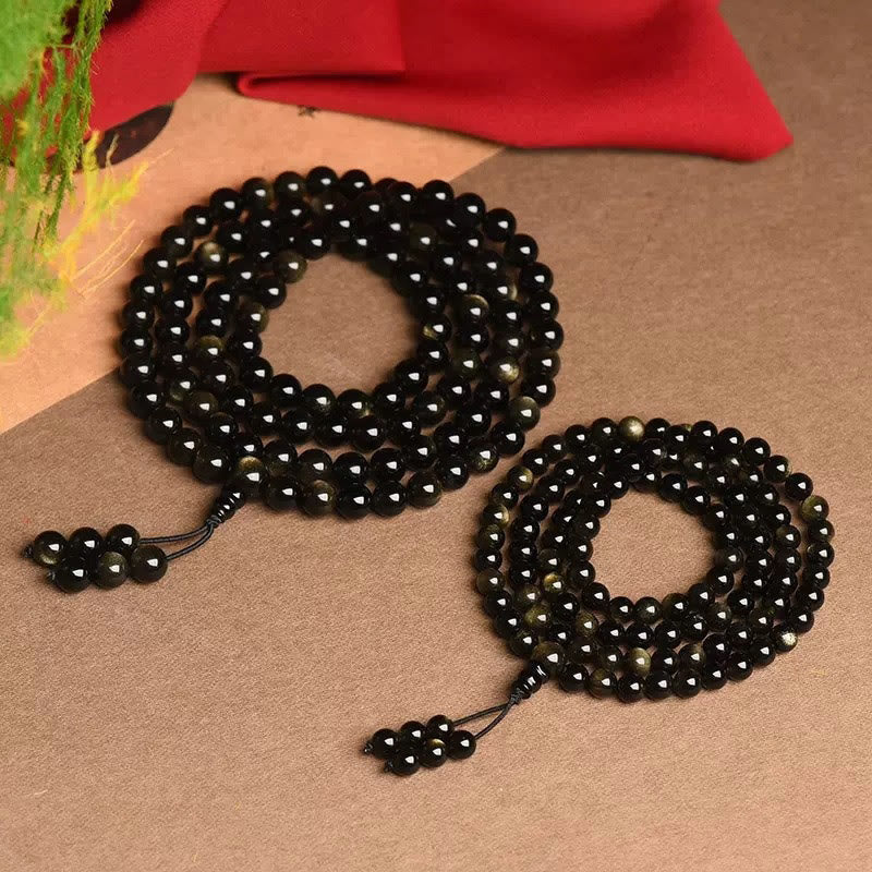 Braccialetto della ricchezza in ossidiana naturale con 108 perle di Mala Buddha Stones
