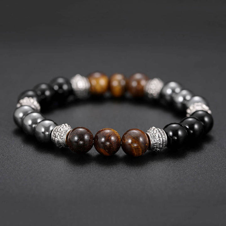 Braccialetto portafortuna e curativo con occhio di tigre e ematite Buddha Stones - image 3