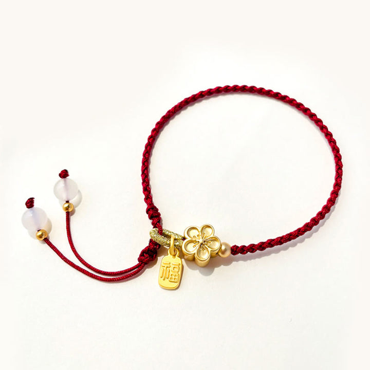 Braccialetto con corda rossa con ciondolo a forma di fiocco con rosetta in fiore di pesco fatto a mano con carattere Fu e nodo Buddha Stones