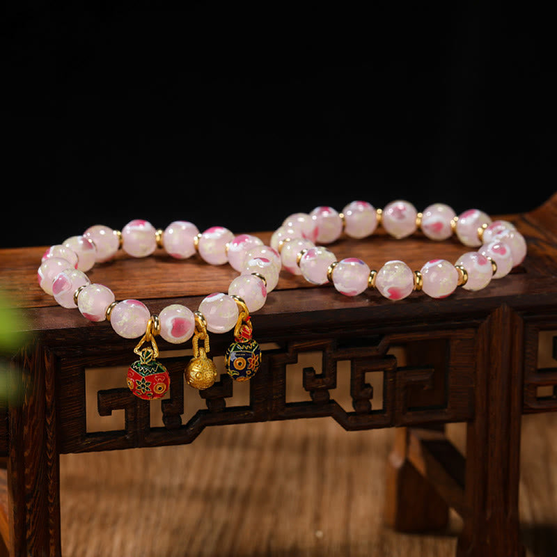 Buddha Stones Oro Deglutizione Bestia Famiglia Ciondolo Luminoso Rosa Cuore Amore Fluorescente Liuli Perline di Vetro Braccialetto Benedizioni