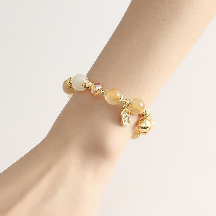Braccialetto con ciondolo fortunato con campanella della ricchezza in quarzo rutilato dorato placcato oro 14K Buddha Stones