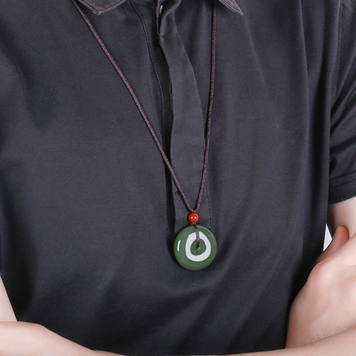 Collana con ciondolo a corda con fibbia della pace in giada rotonda naturale Buddha Stones