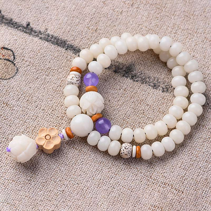 Braccialetto di benedizione del loto Bodhi in giada bianca tibetana Buddha Stones