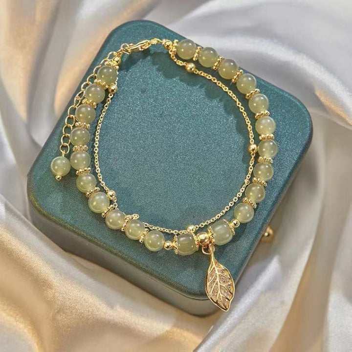 Braccialetto di perline con carattere Fu , Buddha Stones di giada, foglia di ginkgo, tulipano, arachidi e fortuna - image 1
