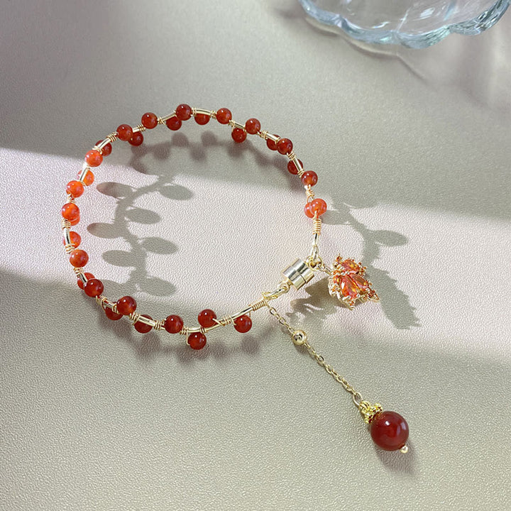 Braccialetto portafortuna con foglia d'acero rosso Buddha Stones