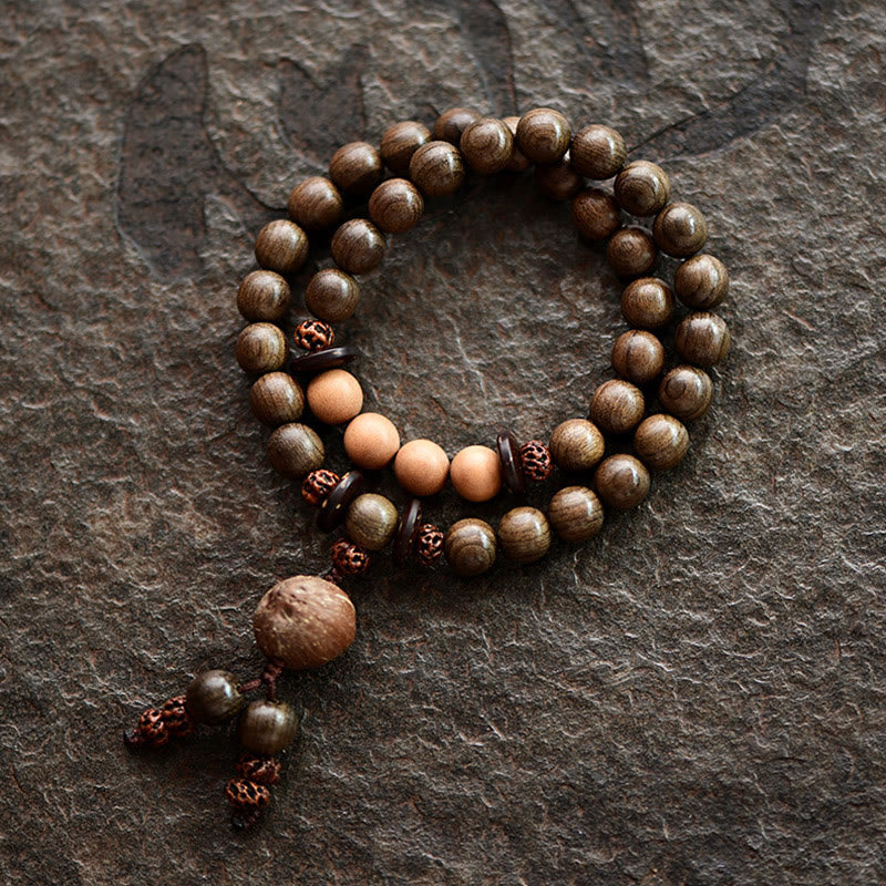 Bracciale Mala con ciondolo di protezione in legno di sandalo tibetano Buddha Stones - Bracciale a doppio giro (17 cm) - 10 mm - image 0
