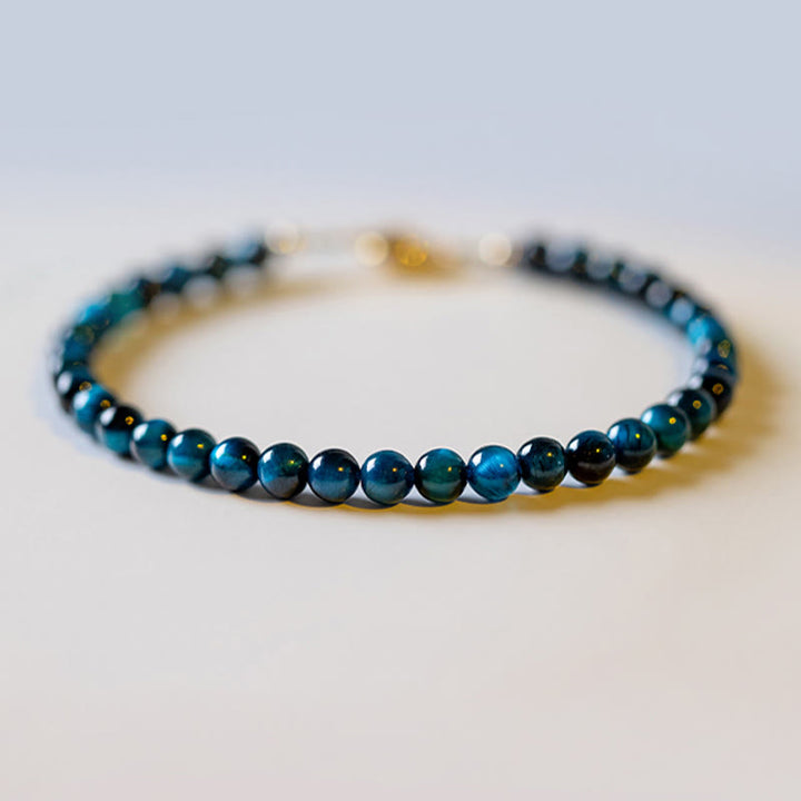 Braccialetto di protezione con catena in pietra naturale occhio di tigre blu Buddha Stones