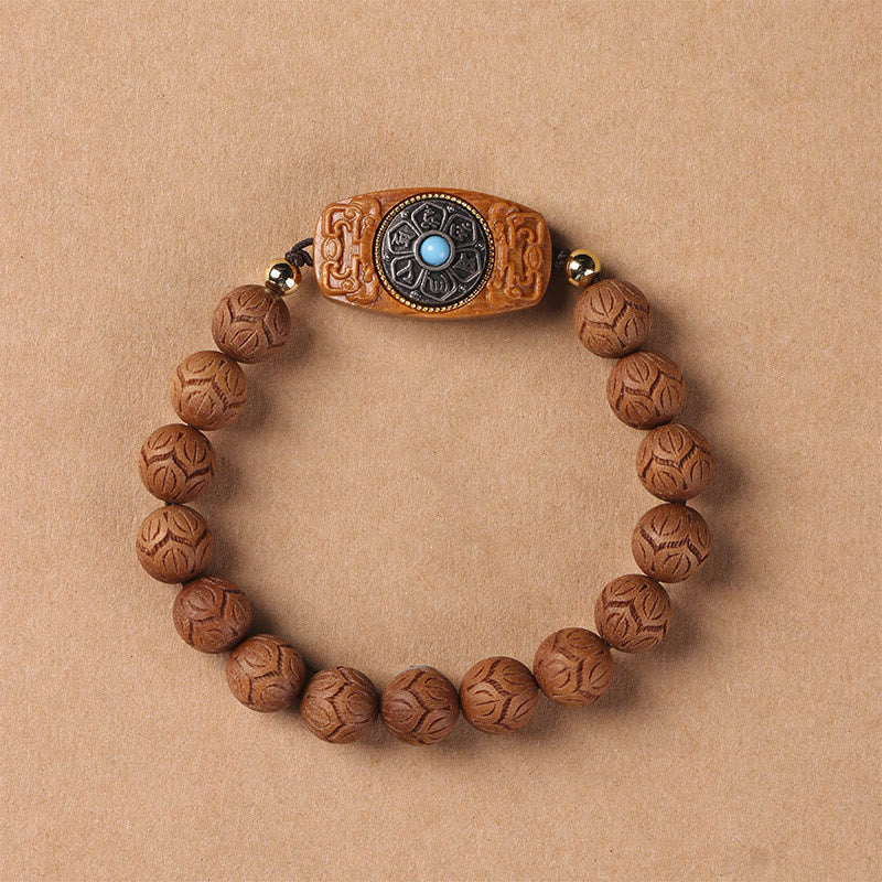 Braccialetto rilassante Om Mani Padme Hum in legno di sandalo verde e legno di ebano e sandalo Buddha Stones