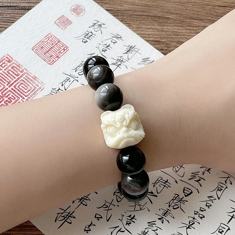 Braccialetto di protezione con leone danzante , Buddha Stones di avorio, seme di Bodhi, pietre di Buddha, argento lucido e ossidiana